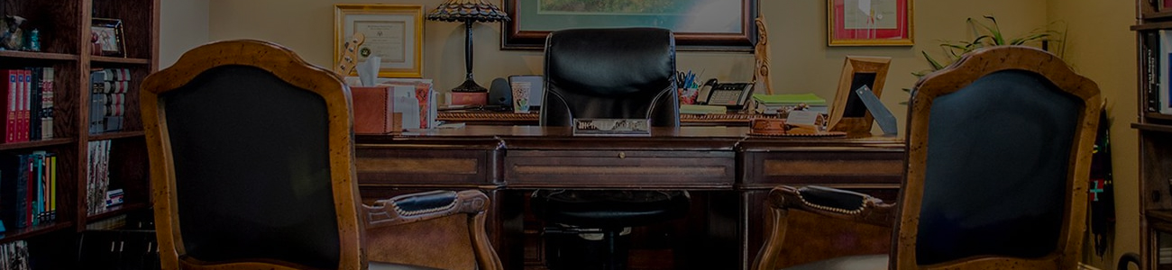 Traditional wooden office desk and chairs
